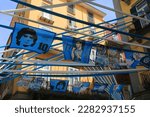 Small photo of NaplesNaplesItaly - March 31 2023: Naples is adorned with the colors of the Societa Sportiva Calcio Napoli team, and with portraits of Diego Armando Maradona, the team's greatest idol.