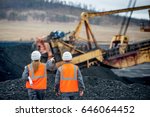 Coal mine workers in an open pit