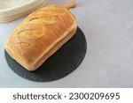 Small photo of Savour the taste of freshly baked bread with this artisanal white rustic loaf. Baked to perfection, the oval-shaped loaf boasts a crispy and crusty exterior with a soft and airy interior.