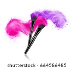 Make up brushes with powder splashes isolated on white background