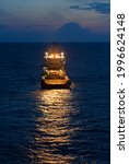 Small photo of Sea towage in the high sea in the evening