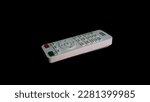 Small photo of BenQ projector remote control with black background