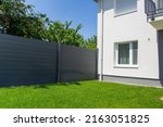 Modern privacy fence as garden or property boundary