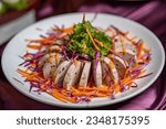 Small photo of Spicy vietnamese sausage salad Yum Moo Yor, Thai food style. Steamed Pork or Moo Yor and Vegetable. (Vietnamese-style Sausage)