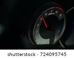 Accelerating car. Throttle goes up in the tachometer.