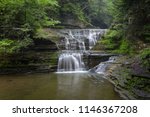 Waterfall Cascades Through Buttermilk Falls State Park, Ithaca, New York, United States of America