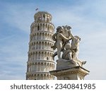 Small photo of Pisa, Tuscany, Italy. September 1, 2011. Piazza dei Miracoli. Marble Leaning Tower (bell tower of the Romanesque), Fontana dei Putti (Fountain with Angels), Sculpted by Giovanni Antonio Cybei.
