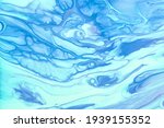 Abstract fluid art background light blue and turquoise colors. Liquid marble. Acrylic painting on canvas with sky gradient and splash. Alcohol ink backdrop with waves pattern.