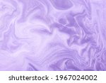 Abstract fluid art background light purple and lilac colors. Liquid marble. Acrylic painting on canvas with violet shiny gradient. Alcohol ink backdrop with pearl wavy pattern.