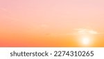 Small photo of Colorful sunset sky in the morning with Yellow, Orange and pink sunrise sky with romantic sweet golden hour horizon sunshine