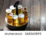 served Koelsch (specialty beer from Cologne) in a typical tray on wooden background