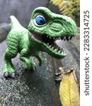 Small photo of Close up trex dinosaurus toys