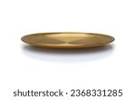 Small photo of Front view of golden plate isolated on white background. Empty gold round flat plate with shadow. Mock up template for food poster design.
