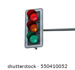 At a traffic light the three colors light up red, yellow and green at the same time.