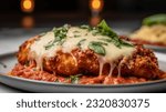 Small photo of Chicken parmesan with pasta and garnishments