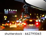 Small photo of CCTV car camera for safety on the road accident on abstract blurred bogey light of city in night background.