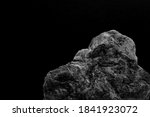Small photo of A Natural Rock, Showing a Reptilian Formation to the Shaped Head with Harsh Texture to the Stone.