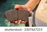 Small photo of This is the old brake pad, it's time to get the new one. the signs of the old brake pad: squeaking, taking longer to stop, and the brake pads appear to be thin like at the photo above.