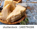 Small photo of Cheese collection, hard italian cheese, aged parmesan and grana padano cheese close up