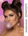 Small photo of beautiful model young girl portrait makeup cute doll bubble gum funny