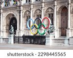 Small photo of Paris, France : March 25'2023 - Five symbolic rings installed in front of city hall of Paris. France will host Olympic games which will be held in the summer of 2024
