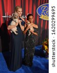 Small photo of Santa Monica, CA/USA - January 19, 2020: Gabby Douglas and Rebecca Romijn attend Hallmark Channel’s 2020 American Rescue Dog Show in Santa Monica, CA.