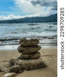 Small photo of Counterbalance stone in the beach