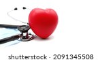 Small photo of Red heart with stethoscope, heart health, health insurance concept, World heart day, world health day, world hypertension day