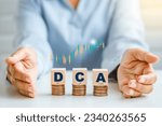 Small photo of DCA coins idea for Dollar Cost Averaging investment strategy Saving stock monthly quarterly basis concept.