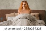 Small photo of Caucasian woman suddenly wake up abruptly on bed in morning afraid about late time hurry to work hurrying student girl overslept panic lateness waking up sudden nightmare after sleeping alarm clock