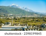 Small photo of The rural areas of Yunnan, China captivate with their serene landscapes, lush greenery. Surrounded by mountains, boast terraced fields, ancient villages.
