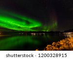 aurora borealis ( Northern light ) over Norvegian Sea in sortland