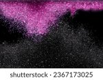 Small photo of Explosion metallic pink black glitter sparkle. Choky Glitter powder spark blink celebrate, blur foil explode in air, fly throw pink glitters particle. Black background isolated, series two of images