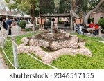 Small photo of Abu Dhabi, United Arab Emirates, March 19, 2023 : A decorative fountain stands in the yard of the Heritable village Abu Dhabi museum in Abu Dhabi city, United Arab Emirates