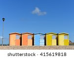 Row Of Colorful Beech Huts And...