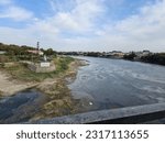 Small photo of Syr Darya River, Tajikistan, text on the photo means "renovation"