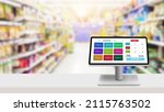 Small photo of POS,Point of sale grocery or retail management system program concept.Modern touch screen cash register on white desk with blurred supermarket as background