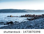 Small photo of Picturesque Adriatic sea landscape with rocky shores, Horatia. Evning light