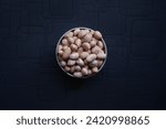 The peanut, also known as the groundnut, goober, pindar or monkey nut, is a legume crop grown mainly for its edible seeds. It is widely grown in the tropics and subtropics, important to both small