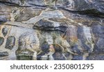 Small photo of Colorful patterns formed, by water flow in rock, alcove; Saunders Island, Falkland Islands