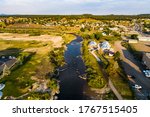 aerial drone views during morning sunrise over Pagosa Springs , Colorado , USA looking over the City Landscape from high above River View