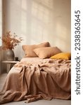 Small photo of Our Warm Tones Bedroom photograph showcases a blend of earthy colors and natural textures, creating a cozy Mediterranean-inspired space adorned with warm autumn hues.