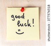 Good luck note on paper post it ...