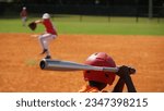 Small photo of Little League Baseball Pitcher to Batter