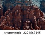 Small photo of Goblins, Hoodoo formations common at Goblin Valley State Park in Emery County, Utah are created via erosion of softer rock by wind and water.