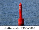Small photo of A spar buoy floats in the waters of Lake Ontario in Canada