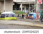 Small photo of Portland, Oregon, USA, August 8th 2023: Homeless encampment under the SE Morrison Bridge in downtown Portland Oregon