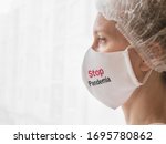 Doctor wearing protection face mask against coronavirus. Stop Pandemia concept. 