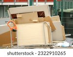 Small photo of bulky waste, old furniture, tables, used things on the street before it is collected, problem of shredding garbage, disposal of bulky refuse, is diverted for recycling, pollution of nature