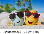 
Happy easter eggs with sunglasses on ocean beach 
